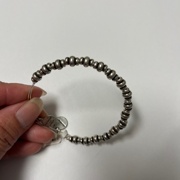 Alex and ANI Shiny Silver-tone NILE Metal BEADED Bangle Bracelet.
Bracelets - Picture 5 of 9